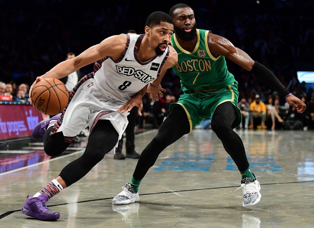 Dinwiddie paces Nets in win over Celtics as Kyrie looks on