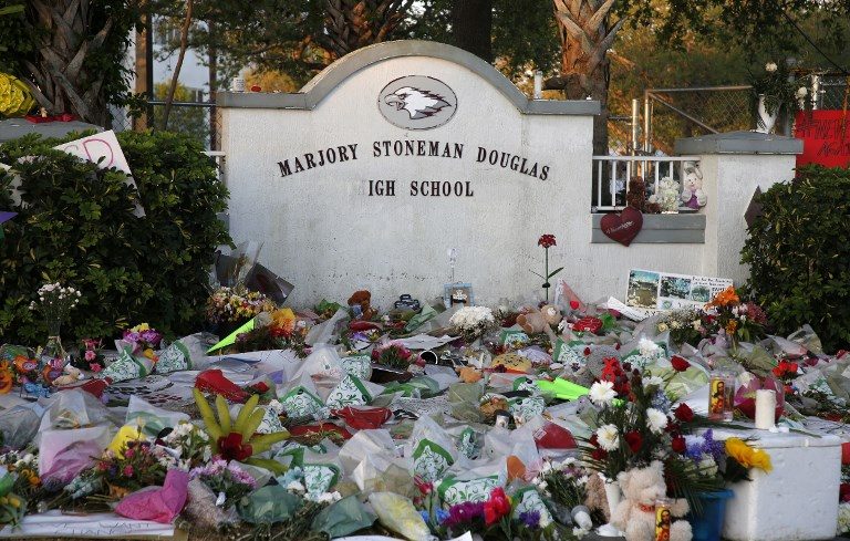 Students make emotional return to Florida school after shooting