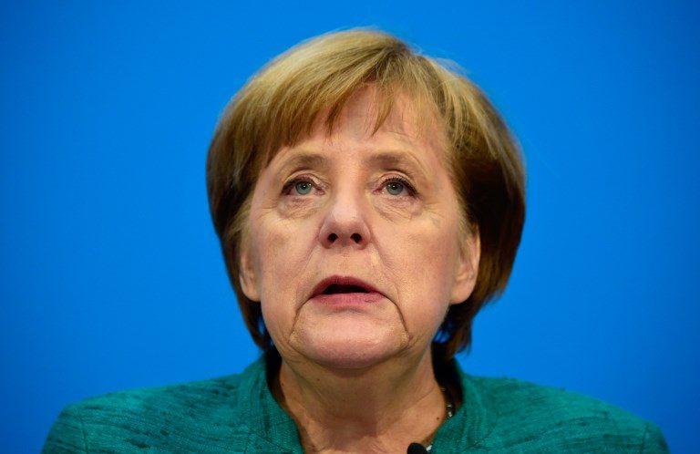 Merkel slams German food charity for migrant halt