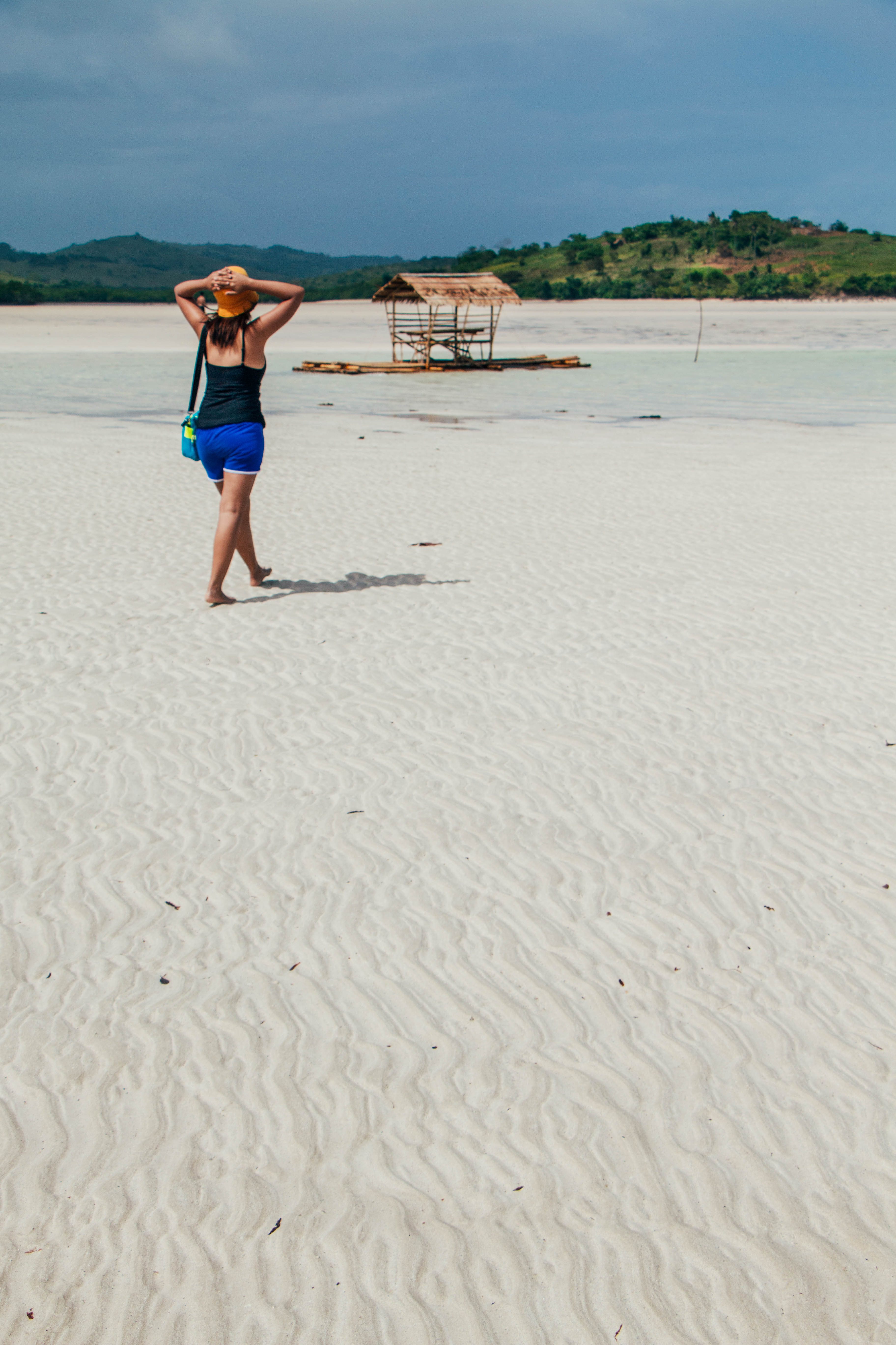Walking in solitude at the famous Manlawi sandbar in Lahuy Island. Photo by Ramir G. Cambiado   