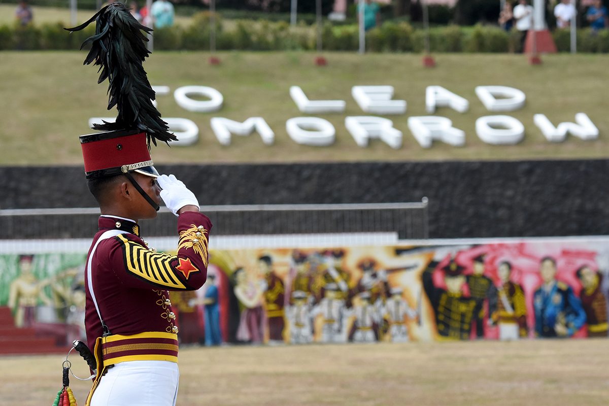 SALUTE. A PNP Academy cadet at the Camp Castañeda field. Photo by Angie de Silva/Rappler  