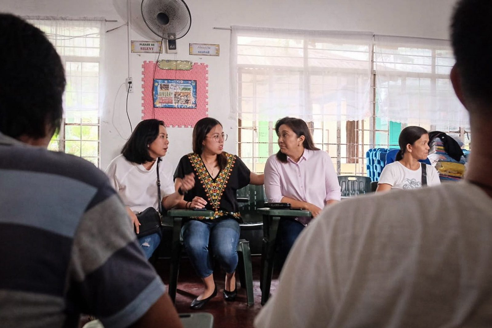 LADIES IN WAITING. Vice President Leni Robredo (right) along with daughters, Aika and Trisha wait for their turn to vote at the Tabuco Central School in Naga City. Photo by Allan Rey Camata   