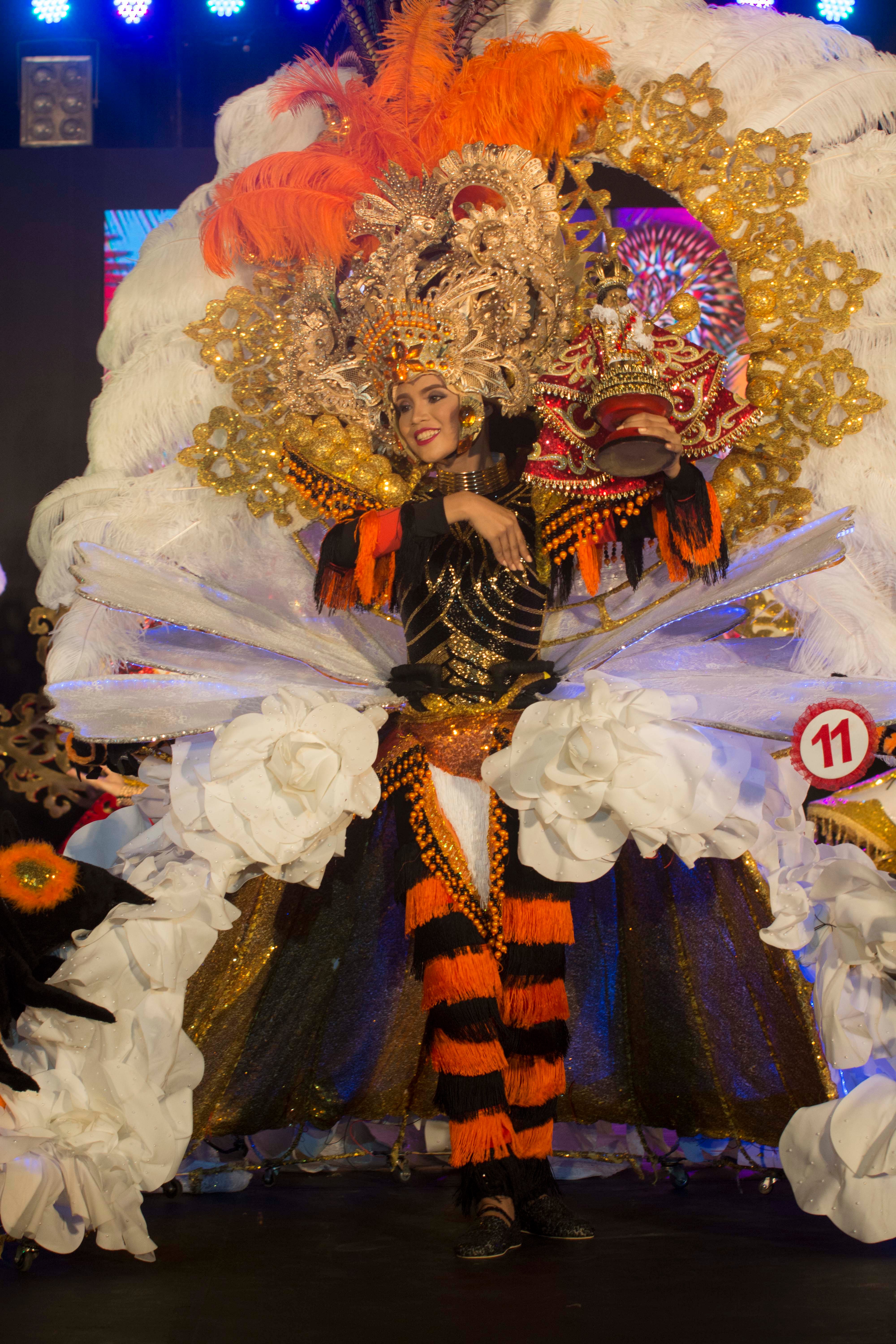 ORANGE AND BLACK. Maerylle Blauta of Tribu Buyoganon of Abuyog, Leyte sashays the runway in her colorful costume  