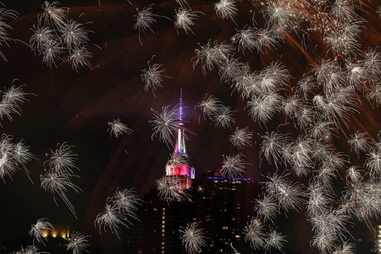 4TH OF JULY. A fireworks show covers the  Empire State Building in New York on July 4, 2017. Photo by Eduardo Munoz/AFP   