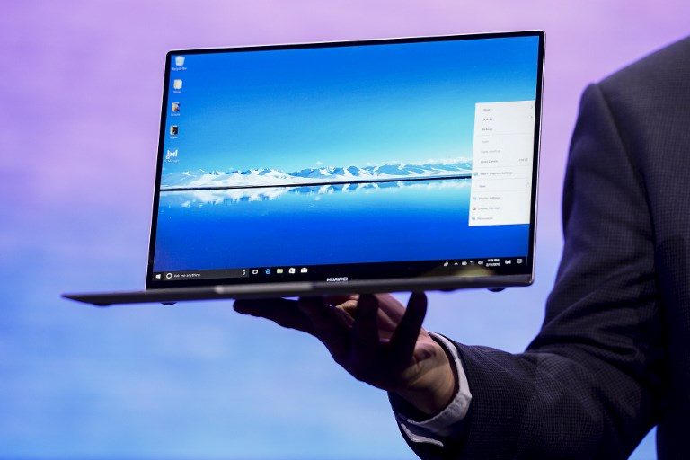 MATEBOOK. Huawei CEO Richard Yu gives a press conference to present the new Huawei MateBook X pro laptop on February 25, 2018 in Barcelona, on the eve of the inauguration of the Mobile World Congress (MWC).
Photo by Josep Lago/AFP 