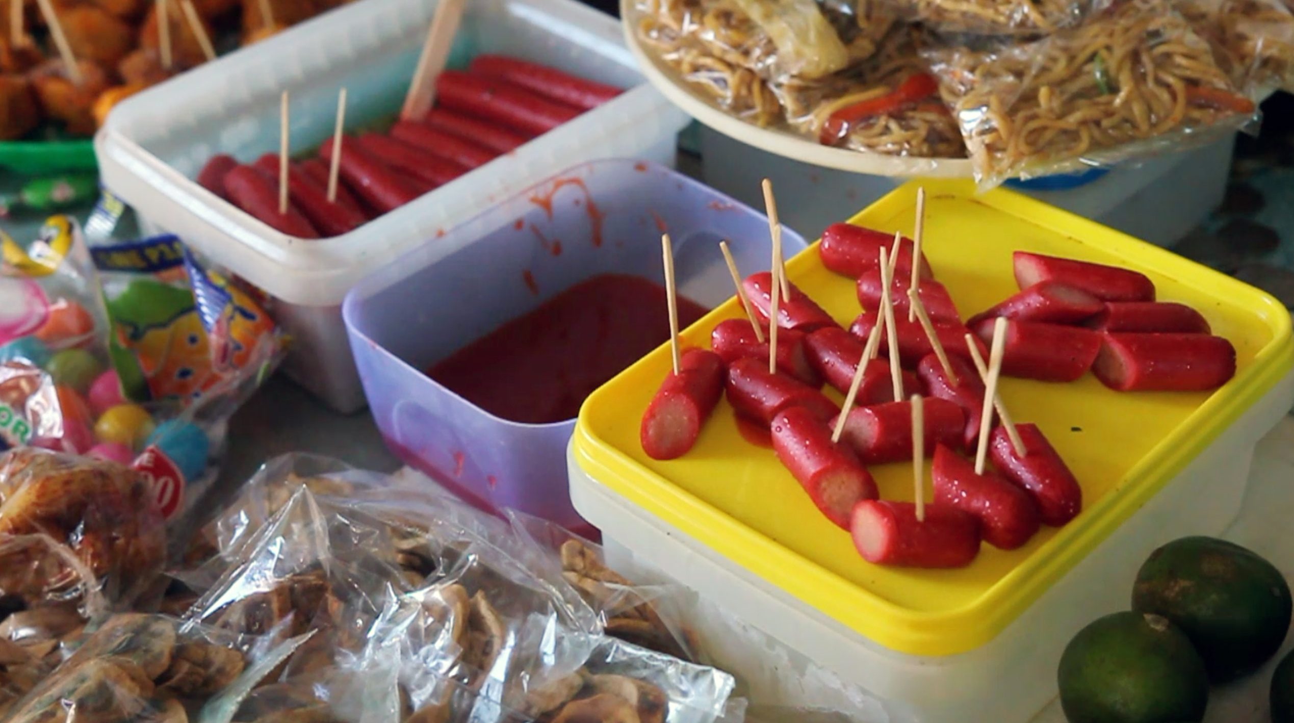 FOOD. Processed food like hotdogs are sold at the Pangantucan Central Elementary School. Photo by Franz Lopez/Rappler  