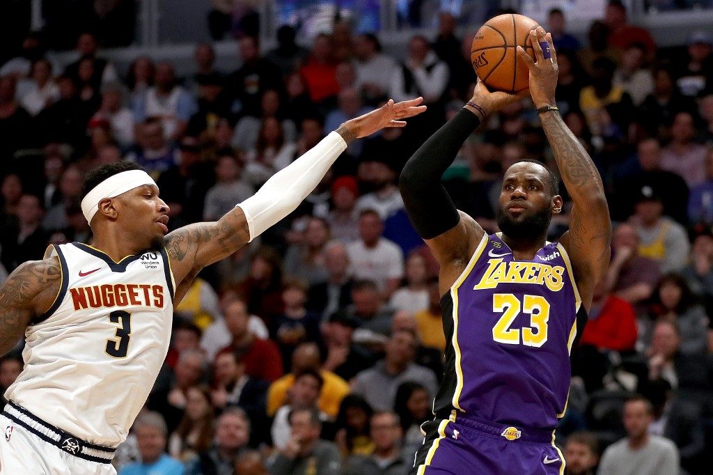 Red-hot Lakers outlast Nuggets in overtime