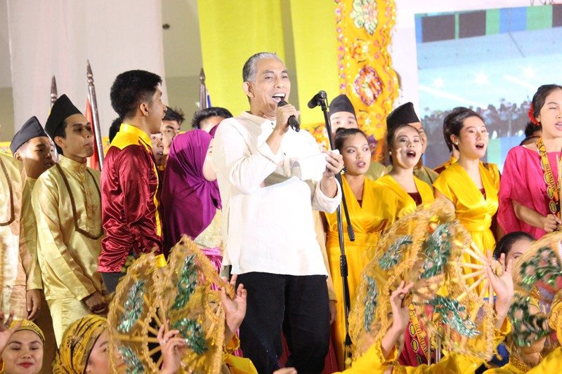 PROUDLY FILIPINO. Filipino artist-singer Joey Ayala performing during the opening ceremony. Photo by Faith Yangyang/ NCCA   
