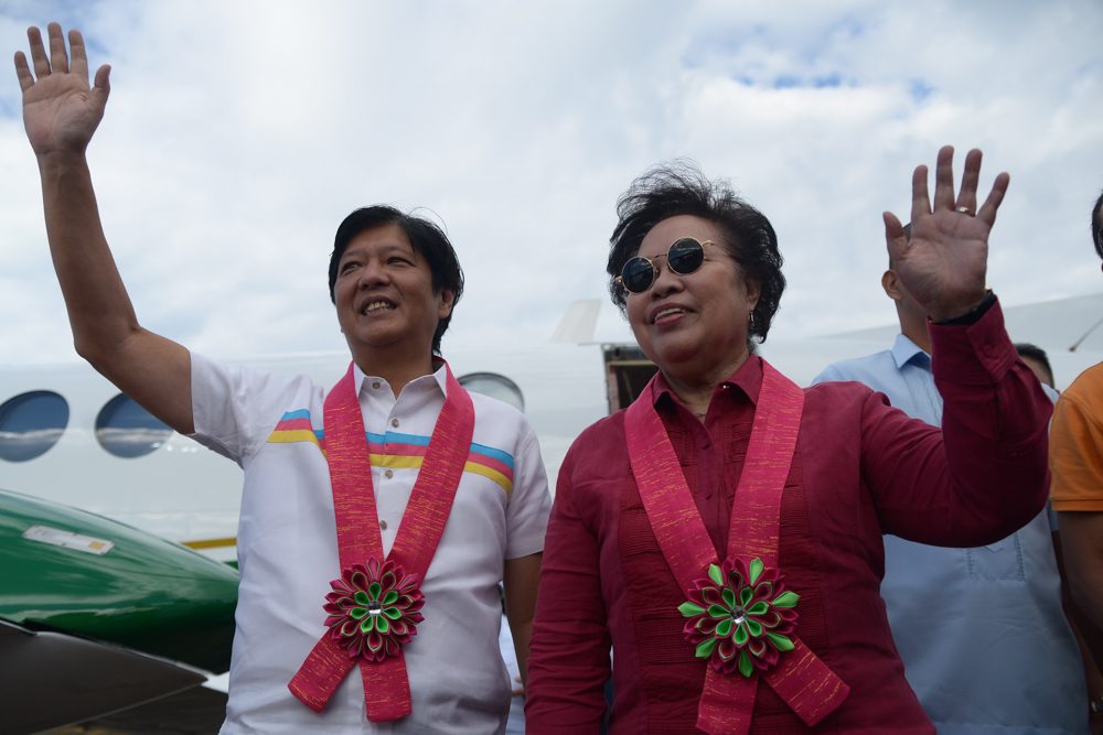 MARCOS COUNTRY. Miriam Santiago and Ferdinand Marcos wave to supporters upon their arrival in Laoag City. Photo courtesy of the Santiago campaign. 