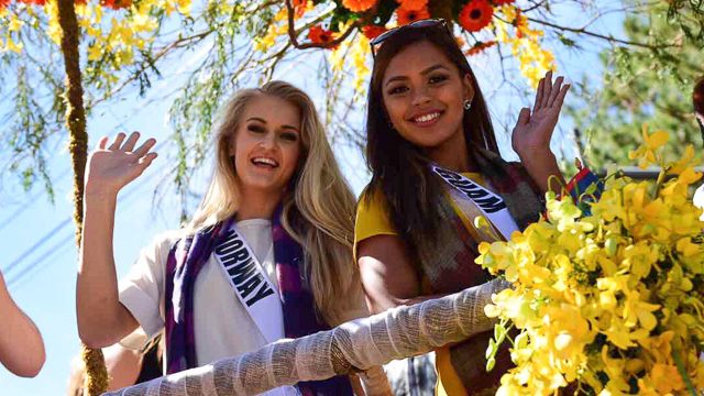 BAGUIO. Miss Norway and Miss Guam wave to their fans at the Miss Universe 2016 parade in Baguio. All photos by Alecs Ongcal/Rappler  