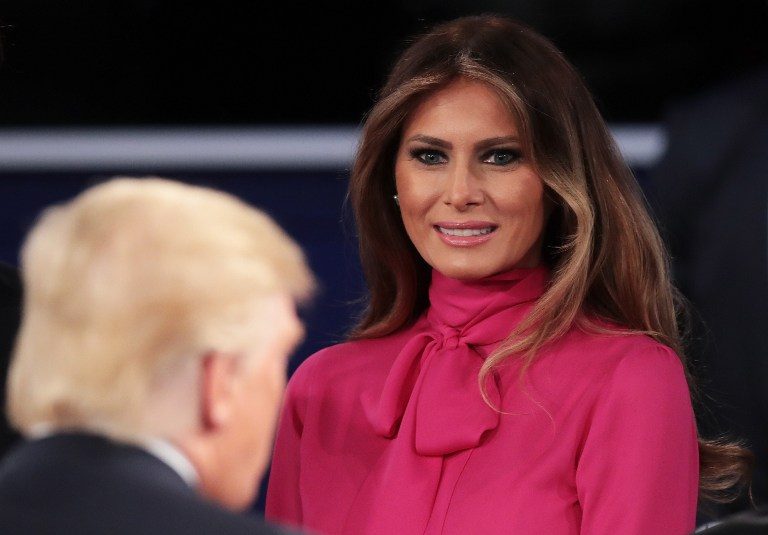 Melania Trump (R) greets her husband Donald Trump after the town hall debate at Washington University on October 9, 2016 in St Louis, Missouri. Scott Olson/Getty Images/AFP 
