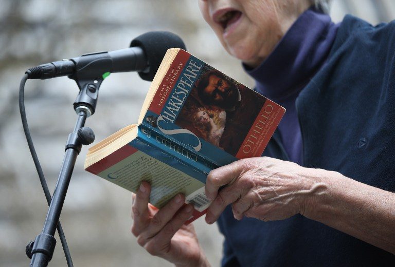 A woman recites a passage from William Shakespeare's Othello during an open mic session on April 23, 2014 in Bryant Park in New York City. John Moore/Getty Images/AFP 
