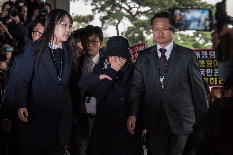 Prosecutors quiz woman at core of South Korea political crisis