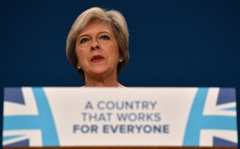 UK PM faces backlash over Brexit immigration plan