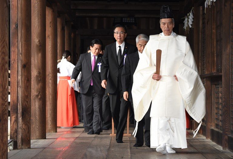 Dozens of Japan lawmakers visit controversial war shrine