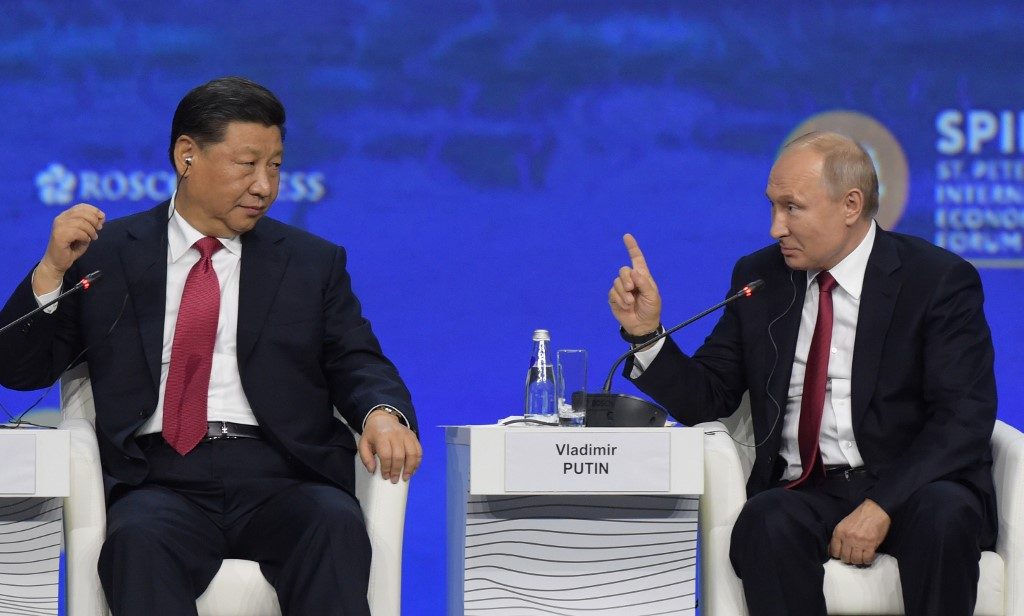 Putin, Xi hit back at U.S. dominance at Russia economic forum