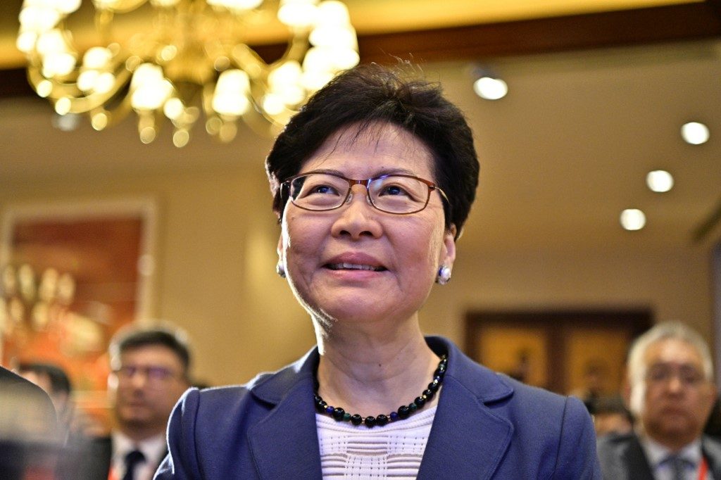 Hong Kong leader hopes peaceful rally presages ‘return to calm’