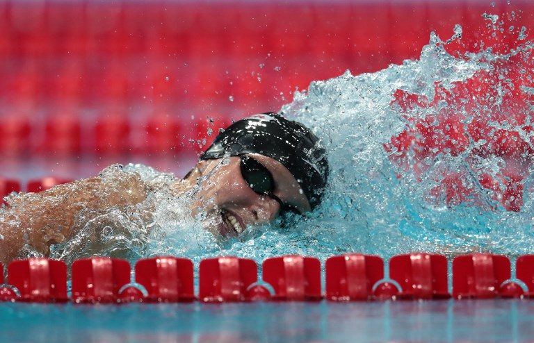 Ledecky smashes own 1,500m freestyle world record in pro debut