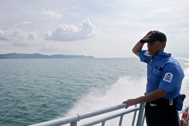 ON THE LOOKOUT. A member of the Malaysian navy patrols the area near Langkawi island, Malaysia, May 15, 2015. Fazry Ismail/EPA 