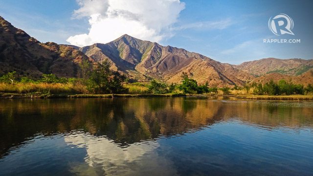 QUIET LAKE AND MOUNTAINS. Afternoon is also the best time to trek inland and see the golden mountains beautifully reflected on Nagsasa’s quiet lake 