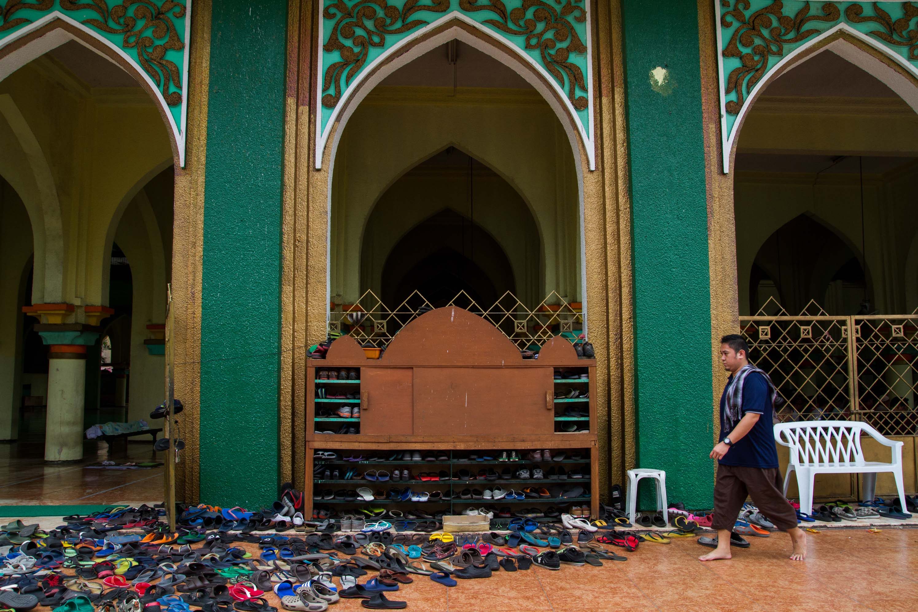 PLACE OF PRAYER. Before entering the mosque or any place of prayer, a Muslim leaves his slippers or shoes outside. There are places of worship where they wash their feet first before entering the premises.  
