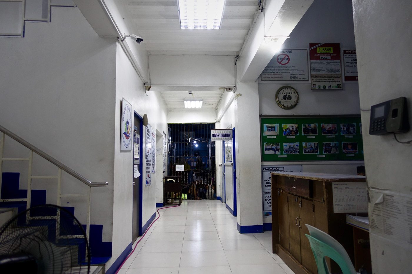 ADULTS ACROSS. The detention facility of the Batasan police station is just across the hall from the women and children protection desk. Photo by Rambo Talabong/Rappler 