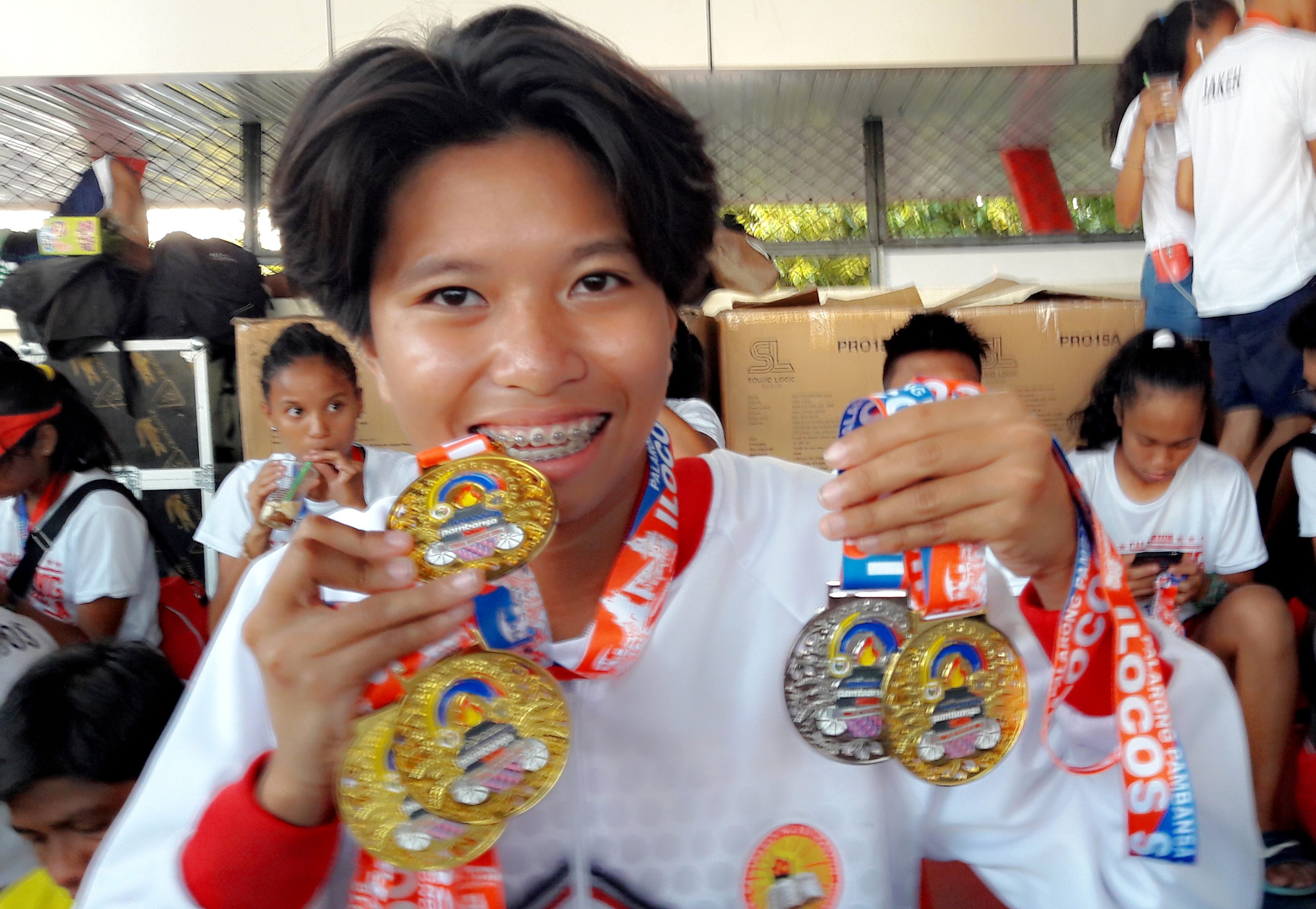 GOLDEN GIRL. Jessel Lumapas collects 4 gold medals and a silver in athletics. Photo by Mau Victa/Rappler  