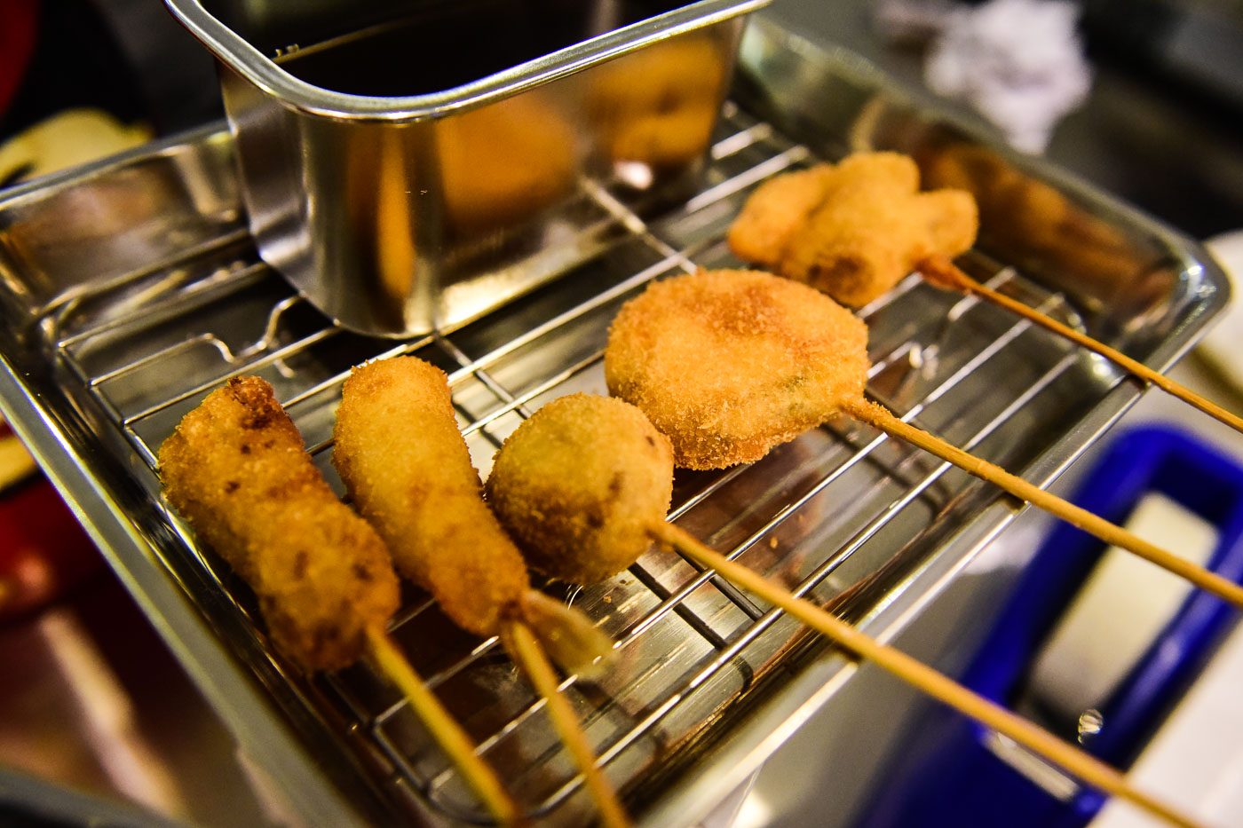 Three sticks item with special dip sauce (sweet potato, classic beef kushikatsu, pork intestine, prawn), P280. Photo by Alecs Ongcal/Rappler 
