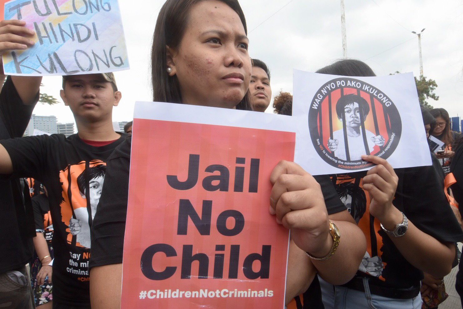 JAIL NO CHILD. A children's advocate holds a sign during a protest at the main gate of the Senate on Friday, January 25, 2019. Photo by Angie de Silva/Rappler  