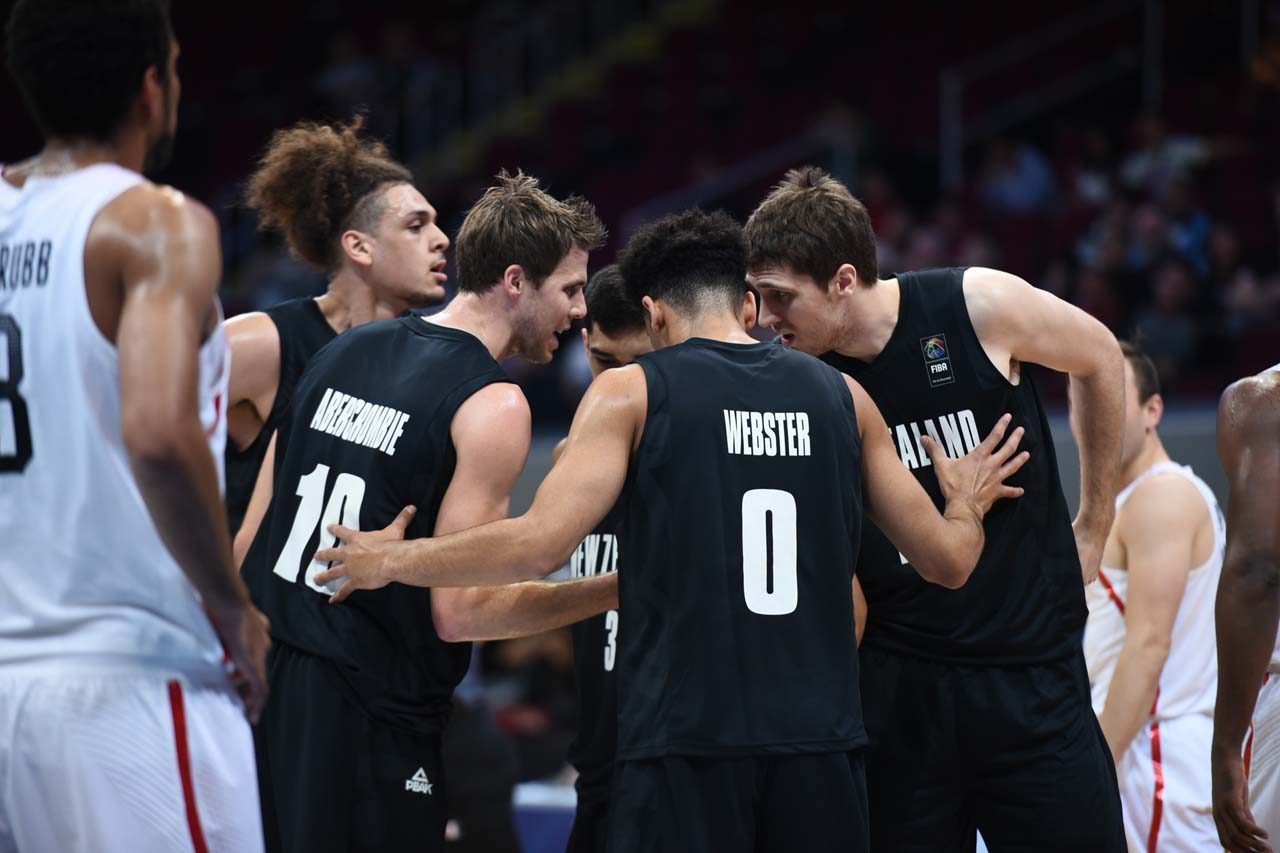 TEAM. New Zealand huddles in the first half. Photo by Martin San Diego/Rappler 