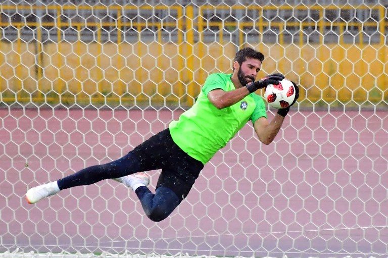 Liverpool signs Alisson in world-record deal