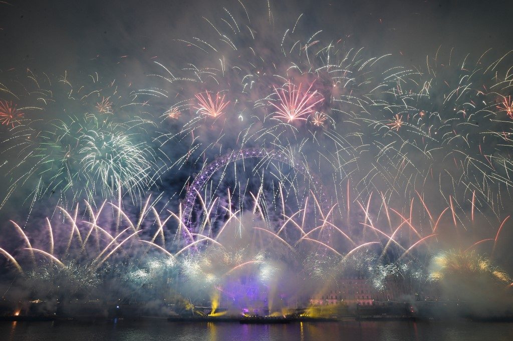 IN PHOTOS: New Year fireworks, smoke, and tear gas as decade begins with a bang