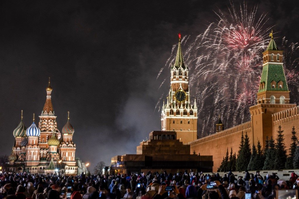 KREMLIN. Fireworks explode over the Kremlin in Moscow during New Year celebrations, on January 1, 2020. Photo by Dimitar Dilkoff/AFP 