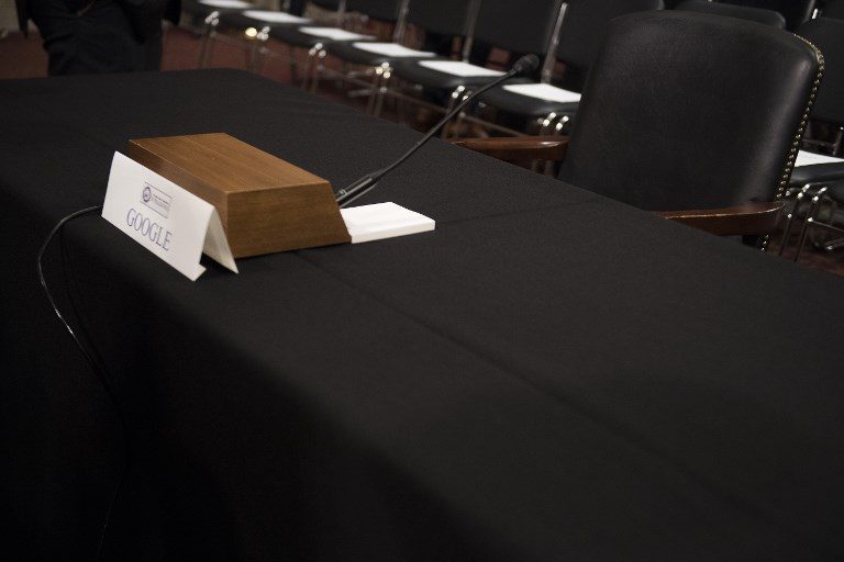 EMPTY SEAT. The seat for Alphabet (Google) CEO Larry Page sits empty as Twitter CEO Jack Dorsey and Facebook COO Sheryl Sandberg testify before the Senate Intelligence Committee on Capitol Hill in Washington, DC, on September 5, 2018. Photo by Jim Watson/AFP 
