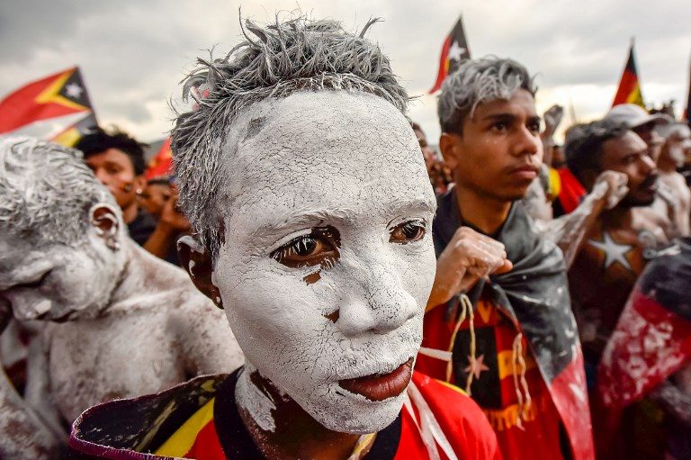 EAST TIMOR POLLS. Fretilin party supporters participate in an election campaign rally in Dili on July 19, 2017. Photo by Valentino Dariel Sousa/AFP   