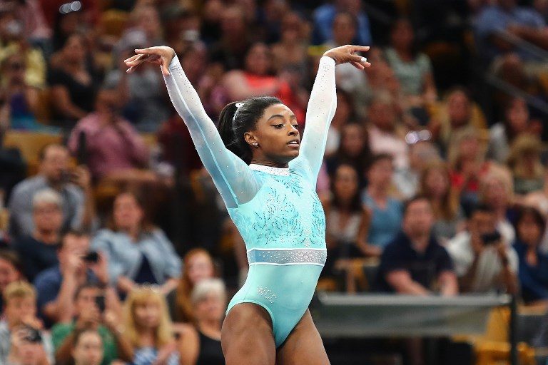 Simone Biles claims record 13th world gold medal