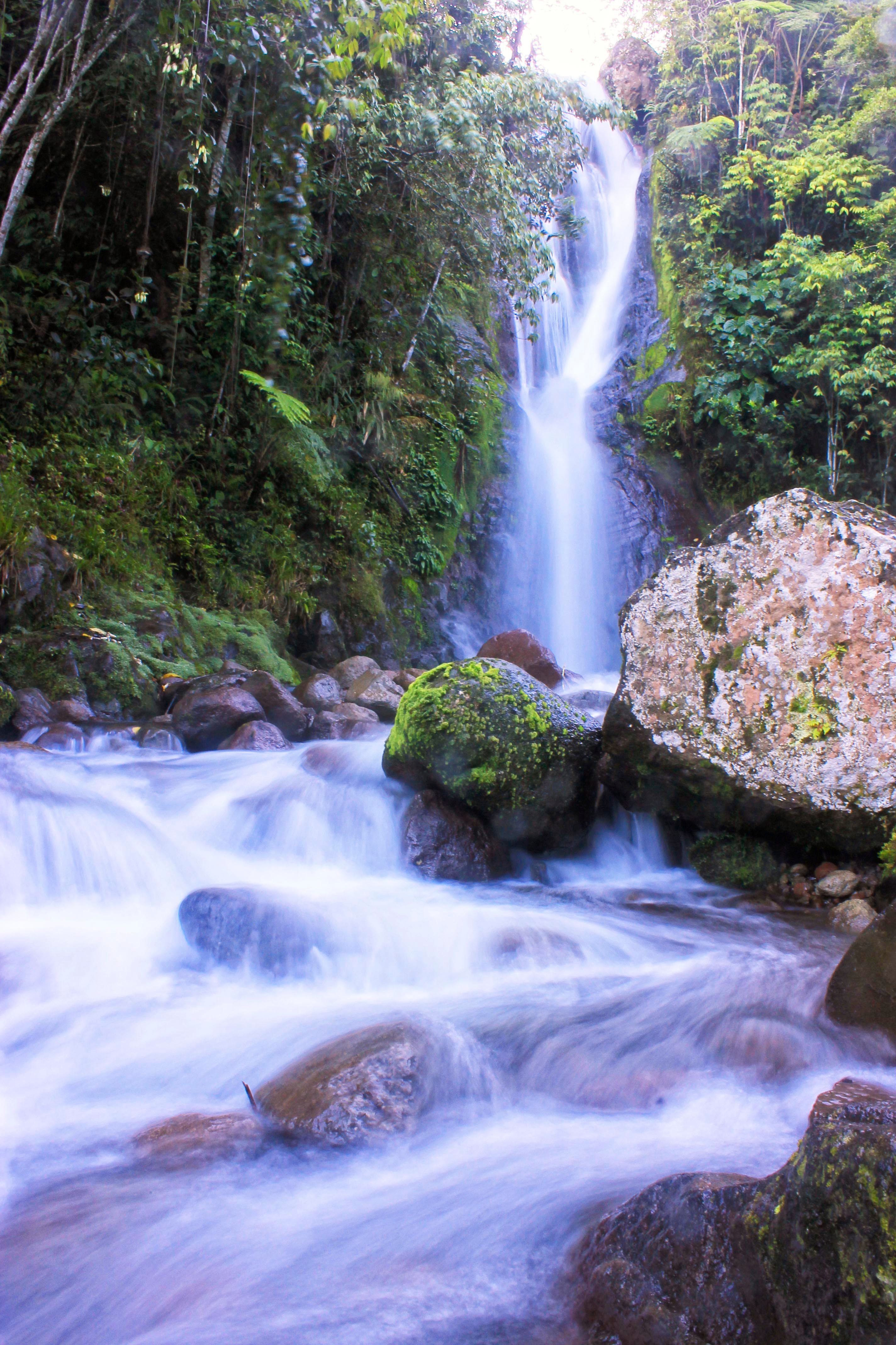 COLD STREAM. Due to its cold waters, Tamsuvan Falls is a favorite spot for trekkers starting the long journey to Mt. Apo. Photo by Louie Lapat 