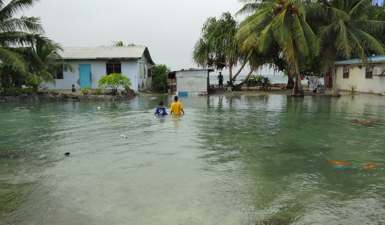 Periled by climate change, Marshall Islands makes carbon pledge