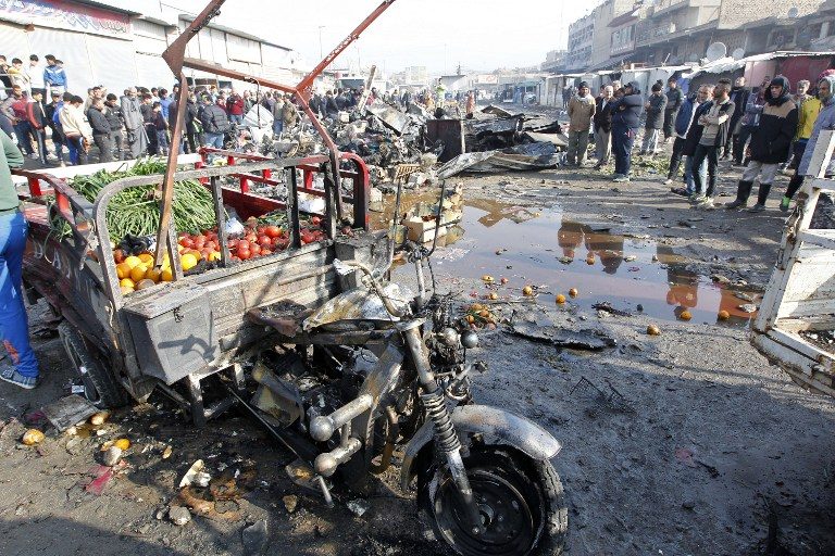 Suicide bombers kill 18 in Baghdad market attacks