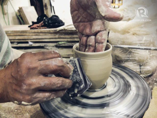 A potter makes a water jug at the Stoneware Pottery, Inc. Ceramics here are exported to Europe, Asia, and the USA. Photo by Bobby Lagsa/Rappler  