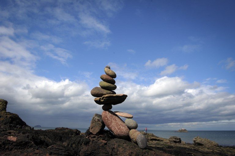 ART COMPETITION. Stacked stones are pictured during the European Stone Stacking Championships 2018 in Dunbar, Scotland, on April 22, 2018. Photo by Andy Buchanan/AFP  