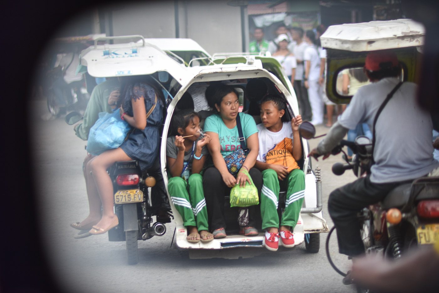 GOING HOME. Student-athletes take tricycles to ferry them to sporting venues. Photo by LeAnne Jazul/Rappler   