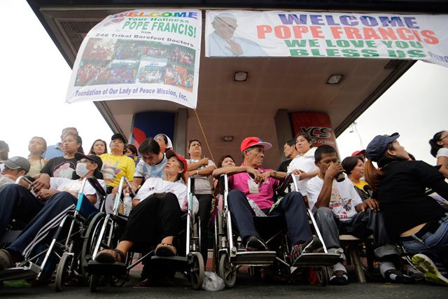 EQUAL ACCESS. Person with disabilities (PWD) await the arrival of Pope Francis in Manila on January 15, 2015. Photo by Ritchie Tongo/EPA  