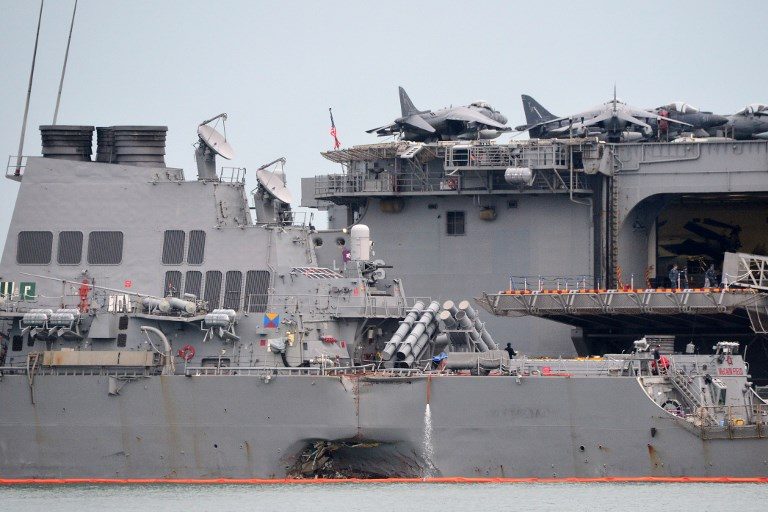 U.S. Navy dismisses commander after deadly warship collision