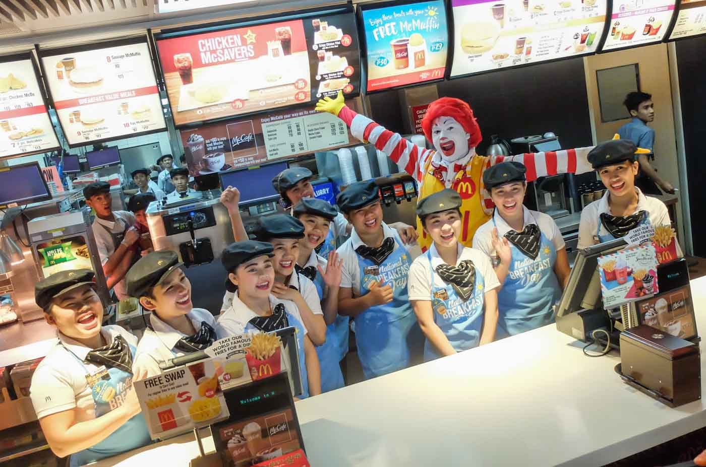 EXCITED AND READY. The McDonald’s crew ready to serve the customers 