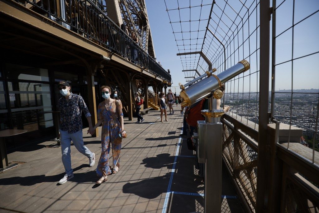 ‘Tears of joy’: Eiffel Tower opens after 104 days of lockdown