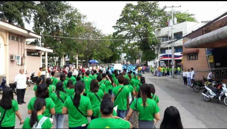 GREEN. Eastern Visayas delegates march along the streets of Dumaguete in their vibrant green regional shirt. Photo by Kent Adal/Eastern Visayas  