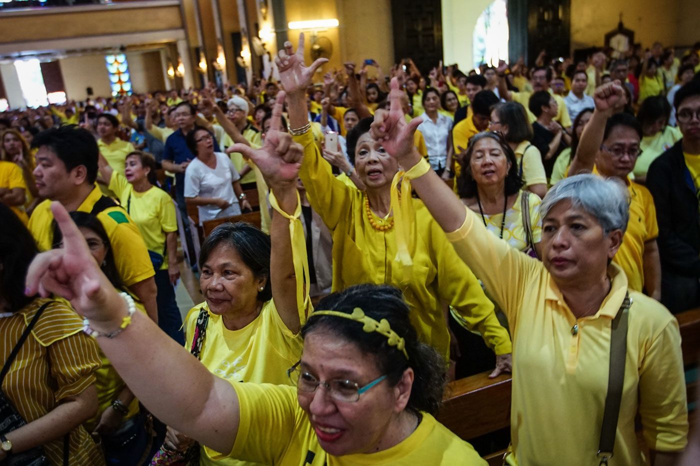 YELLOW FEVER REDUX. People gather for the Mass for National Transformation at the Santo Domingo Church in Quezon City on August 21, 2018, to commemorate the 35th death anniversary of former Senator Benigno 'Ninoy' Aquino Jr. Photo by Jire Carreon/Rappler     