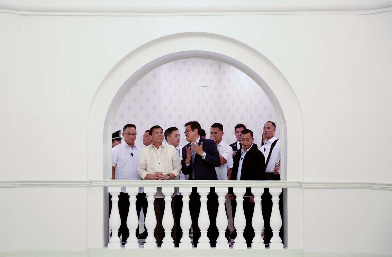 GRAND OPENING. President Rodrigo Duterte is given a tour inside the Rizal Park Hotel in Manila during its opening on July 26, 2017. Photo by Simeon Celi/Presidential Photo   