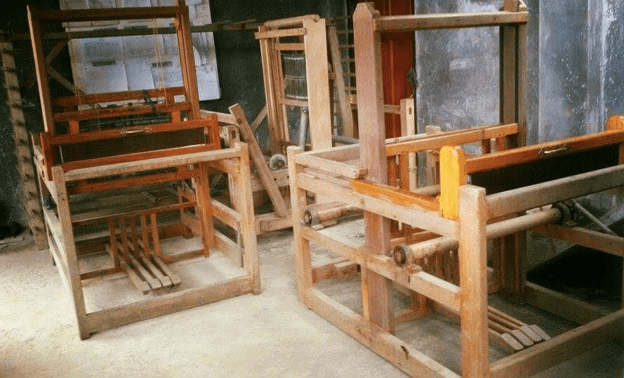 Upright looms can be found at the weaving center in Julongan village  
